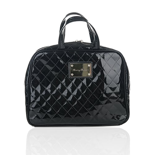 This toiletry bag is perfect for your next mother-daughter trip. 
Cherry Blooms Quilted Patent Leather Toiletry Bag ($35)