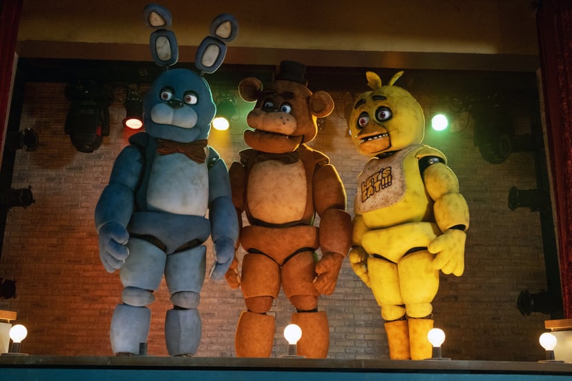 FIVE NIGHTS AT FREDDY'S, from left: Bonnie (Jade Kindar-Martin), Freddy Fazbear (Kevin Foster), Chica (Jess Weiss), 2023. ph: Patti Perret /  Universal Pictures / Courtesy Everett Collection
