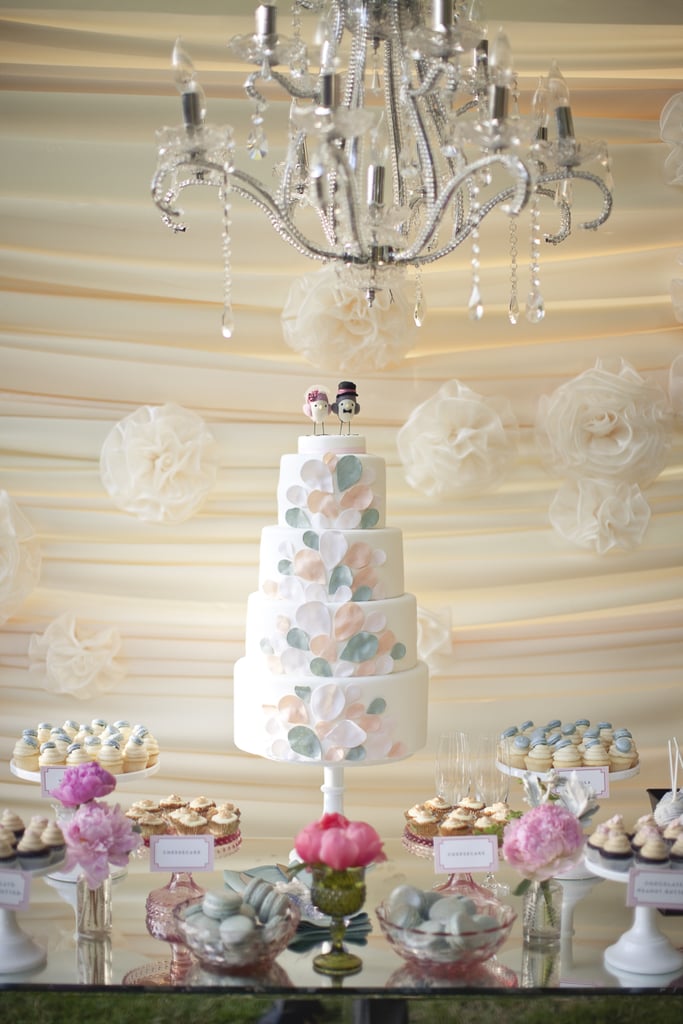 The soft colors and design of this dreamy cake look like a mix between balloons and flower petals.
