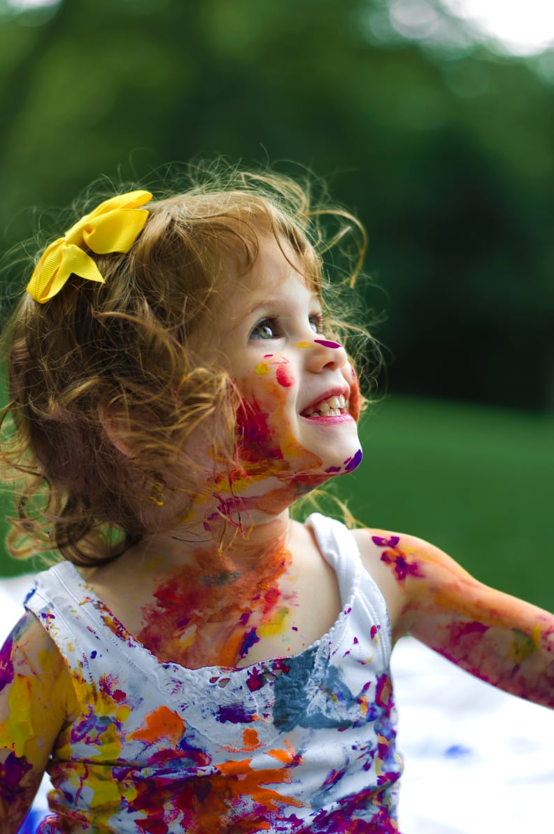 Age 3: Embrace the chaos and let them explore by getting messy.