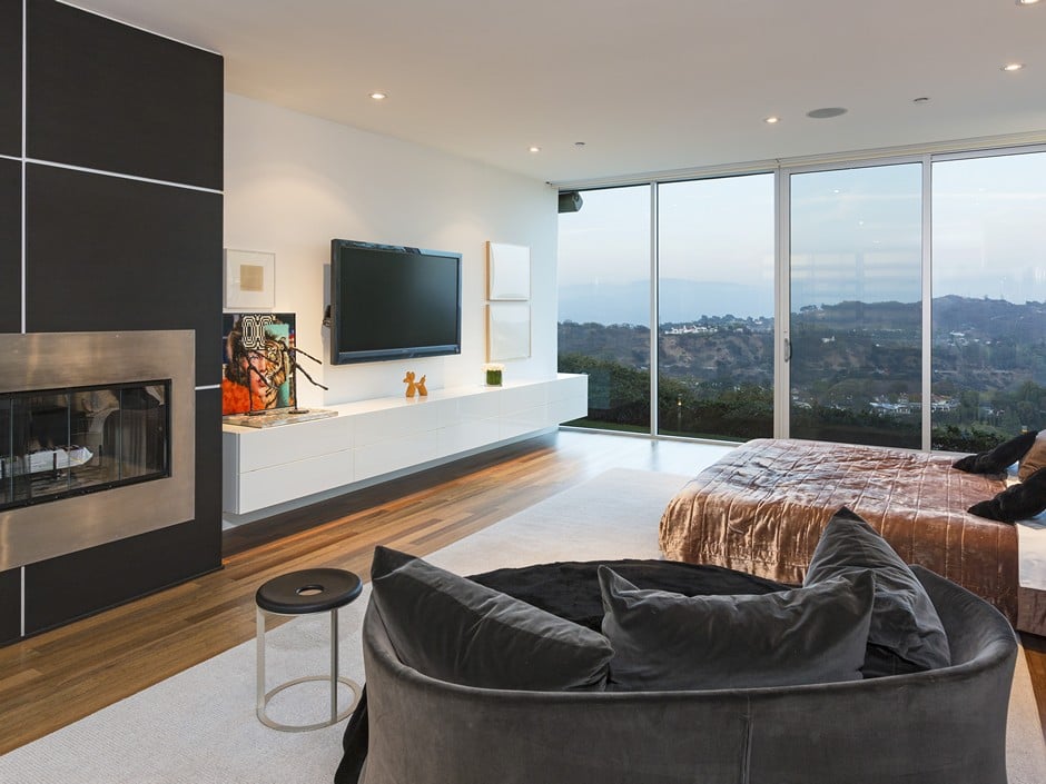 Practice yoga or curl up on the couch to enjoy the stunning views of Laurel Canyon.