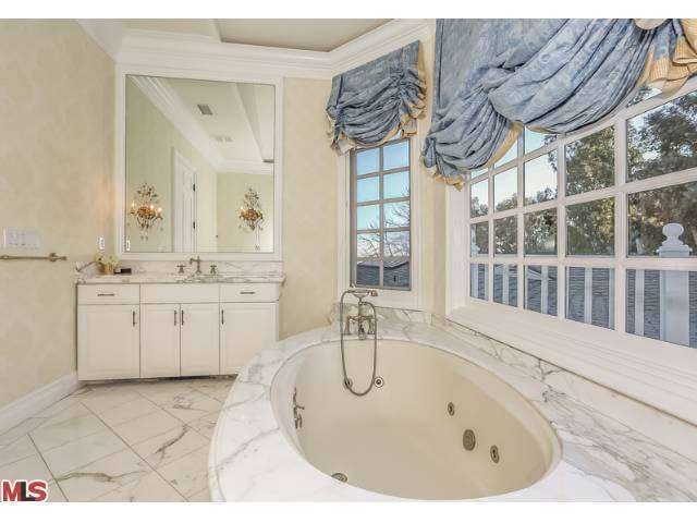 Expensive marble covers nearly every surface of this bathroom, thought to belong to twins Moroccan and Monroe.
