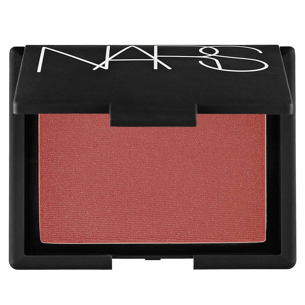 He contoured her eyelids, cheeks, and jawline with a taupe blush, and applied bronzer to her forehead. Focus this NARS blush ($30) on those points to really make your face pop.