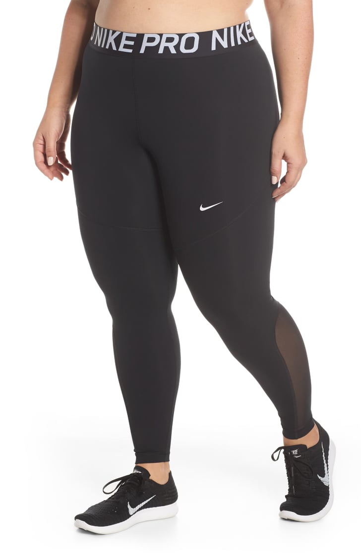 nike tights with nike logo all over
