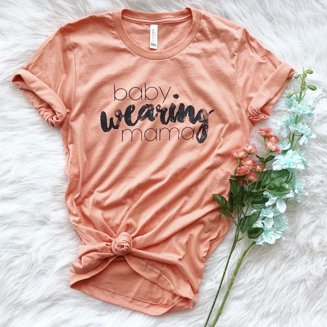 baby wearing t shirt
