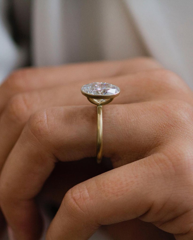 Charon Jewel Oval Cut Moissanite Solitaire Engagement Ring ($1,175)