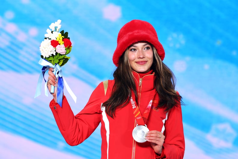 ZHANGJIAKOU, CHINA - FEBRUARY 15: Silver medallist Ailing Eileen Gu of Team China poses with their medal during the Women's Freestyle Skiing Freeski Slopestyle medal ceremony on Day 11 of the Beijing 2022 Winter Olympic Games at Zhangjiakou Medal Plaza on