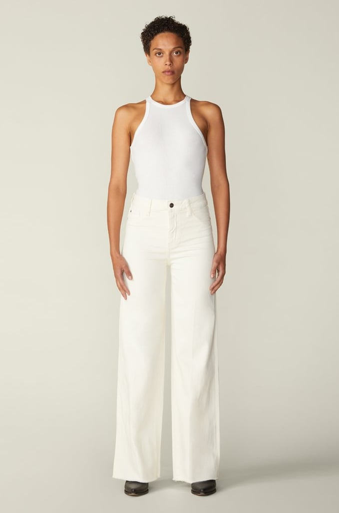 "Nothing says 'optimism' like Warp + Weft's white, high-waist NCE wide-leg jeans ($98). Since the days are all blending together anyway, I figure there's no harm in breaking the dated 'not after Labor Day' rule. Plus, Warp + Weft prides itself on sustainability — a regular pair of jeans uses 1,500 gallons of water, whereas their styles require fewer than 10 gallons. The more you know!"