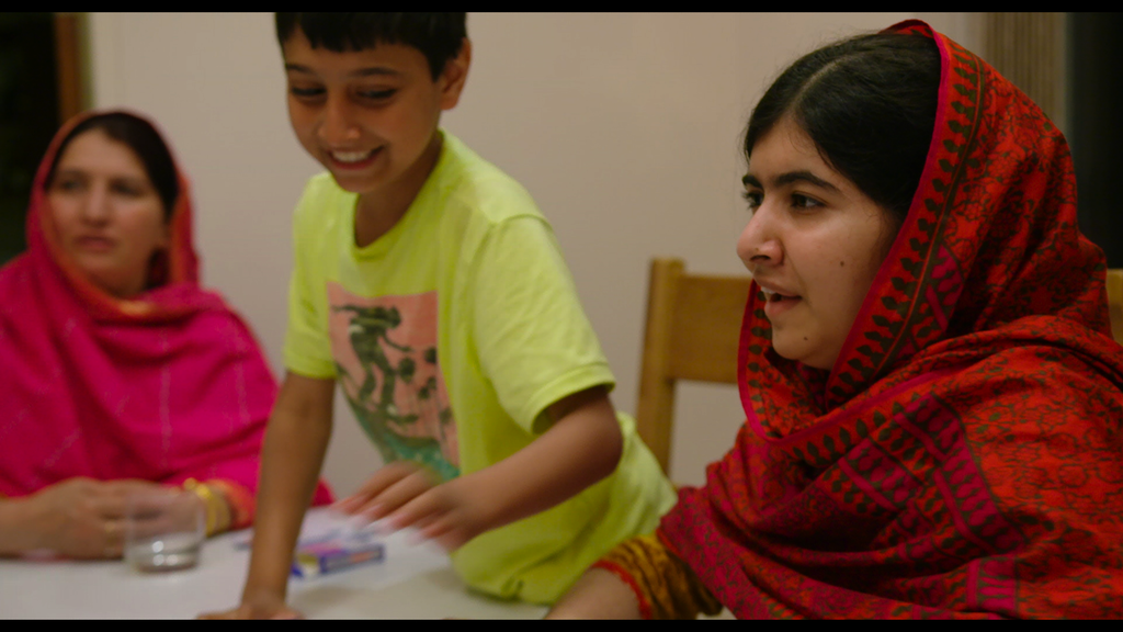 Toor Pekai, Atal, and Malala at home in England.