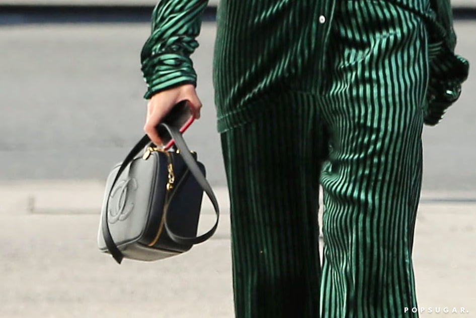 Hailey Bieber Matches $1,800 Louis Vuitton Bag With Satin Pajamas