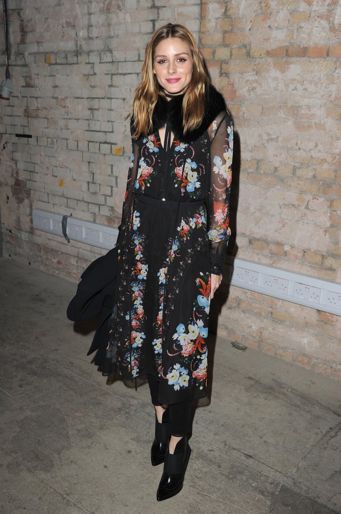 For the Erdem show in London, Olivia gave us a valuable lesson in layering, adding a floral dress over pants and topping it all off with a furry capelet.