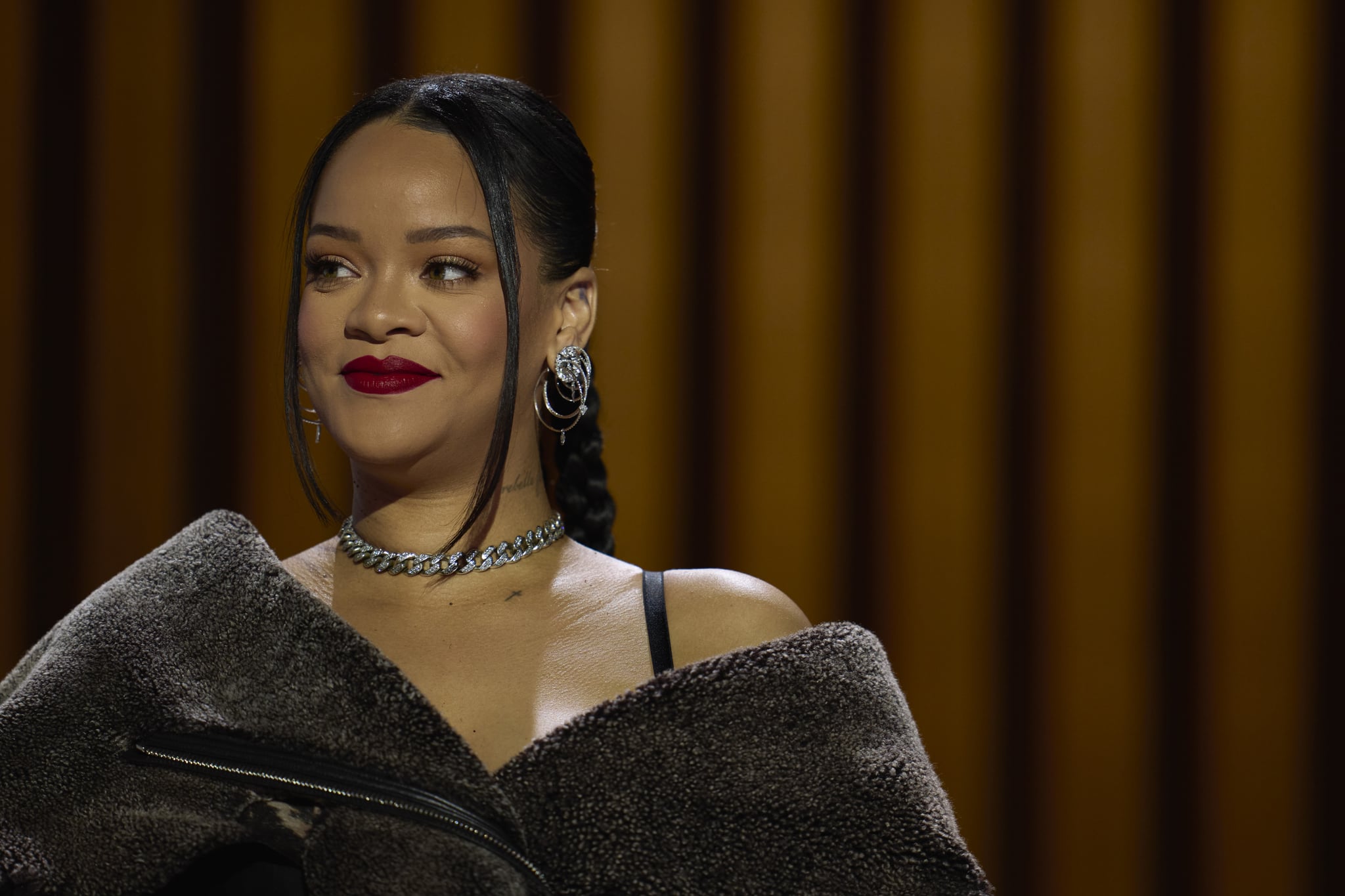 PHOENIX, AZ - FEBRUARY 09: Rihanna speaks during a press conference for the Apple Music Super Bowl 57 halftime show at the Phoenix Convention Centre on February 9, 2023 in Phoenix, Arizona. (Photo by Cooper Neill/Getty Images)