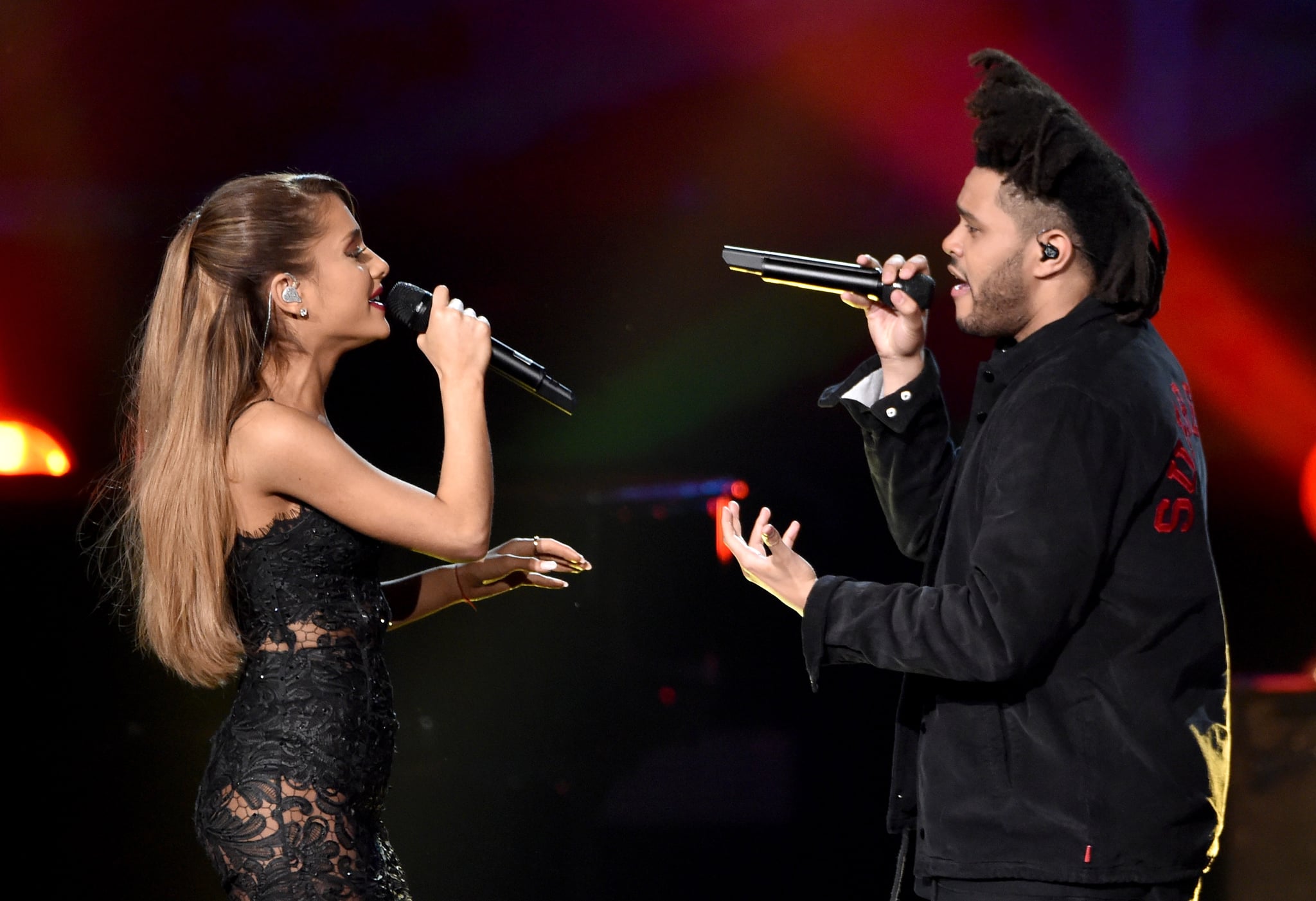 LOS ANGELES, CA - NOVEMBER 23:  Recording artists Ariana Grande (L) and The Weeknd  perform onstage at the 2014 American Music Awards at Nokia Theatre L.A. Live on November 23, 2014 in Los Angeles, California.  (Photo by Kevin Winter/Getty Images)