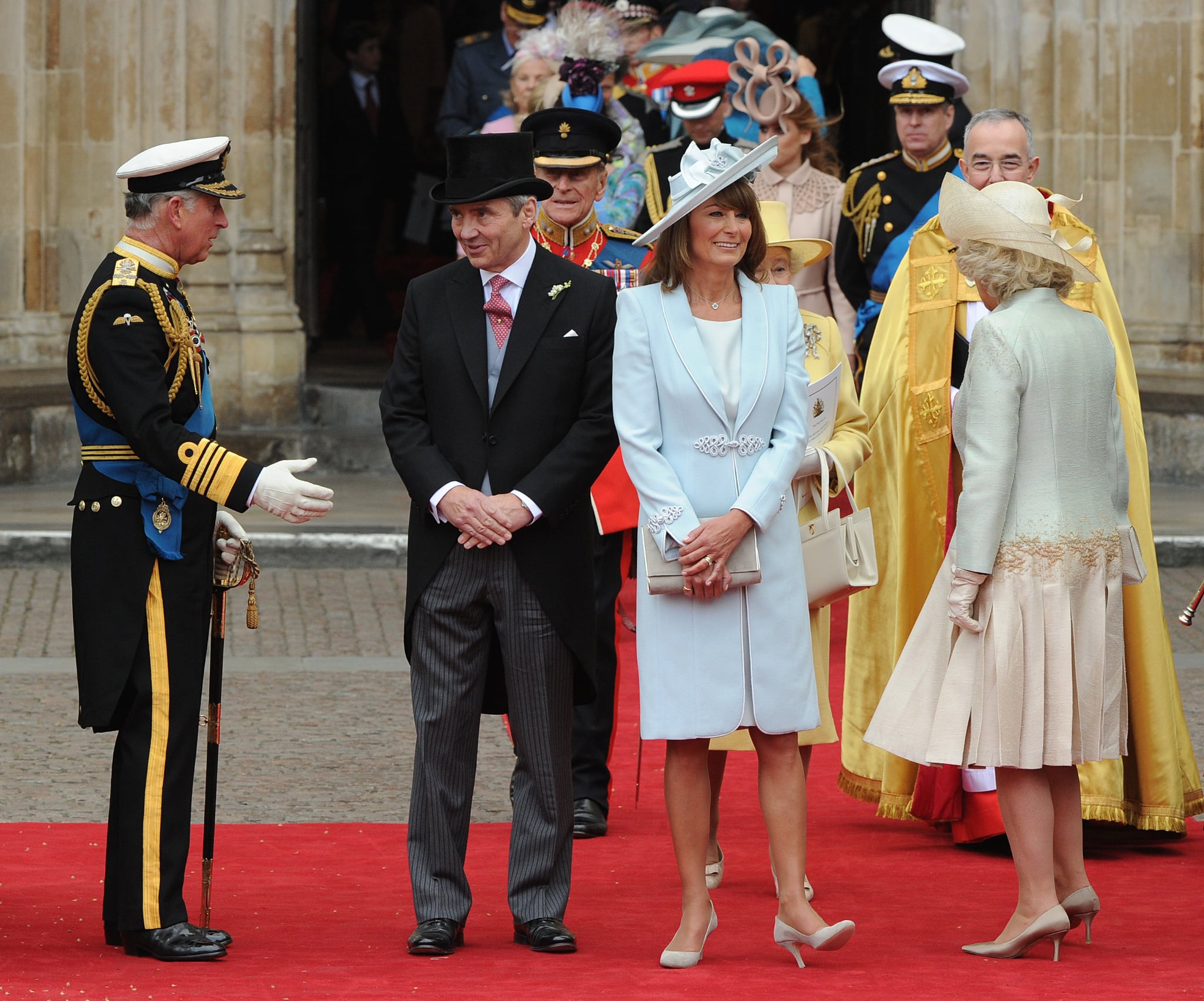 (From L to R) Britain's Prince Charles, Michael Middleton, Carole Middleton and Camilla, Duchess of Cornwall come out of Westminster Abbey in London, following the wedding ceremony of Prince William and Kate, Duchess of Cambridge, on April 29, 2011.  AFP PHOTO / CARL DE SOUZA (Photo credit should read CARL DE SOUZA/AFP/Getty Images)