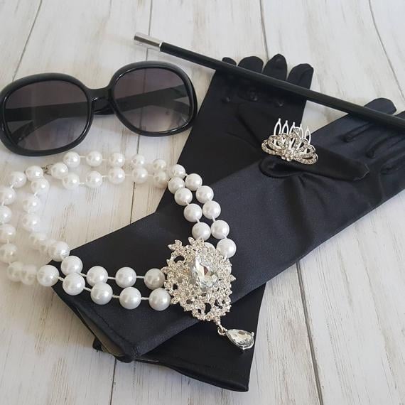 pearls, gloves, and sunglasses