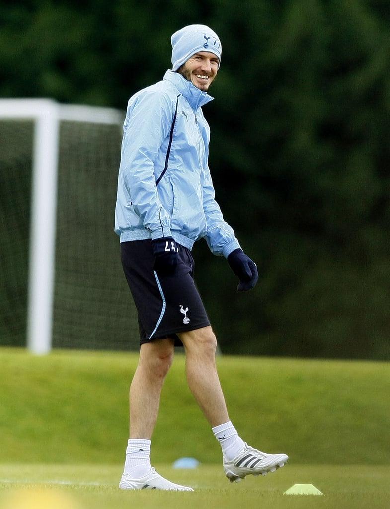 David Beckham wore his Spurs outfit today as he took to the pitch with his new teammates. Although it looks like Becks will only train with the side, Harry Redknapp is still hopeful that a deal can be done that will see David play as part of the team during his loan. He arrived at the complex this morning, while pregnant Victoria spends time with her family. David shared a joke on the training ground with Peter Crouch, who is also expecting a child. Having undergone a medical at the club, David's now free to enjoy being back in the Premier League.