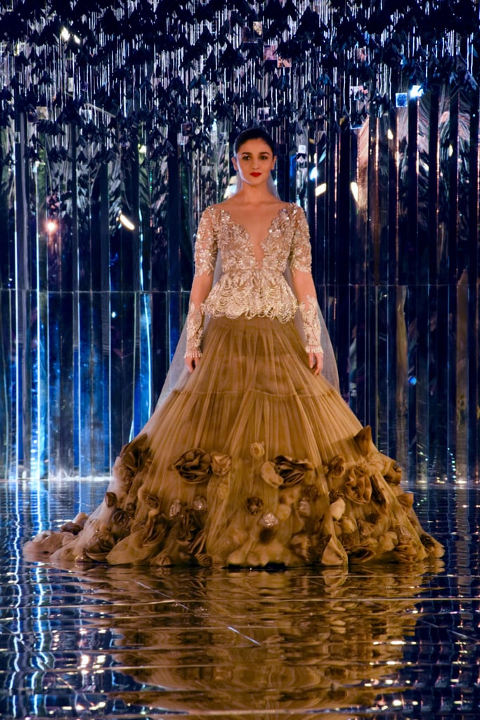 Walking the runway in a show-stopping Manish Malhotra outfit.