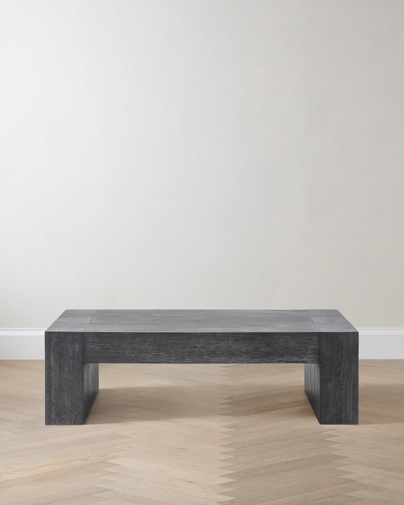 Quince Reclaimed Oak Waterfall Coffee Table ($1,400)
If surface area trumps storage in your coffee table criteria, then this design is for you. Due to the thick oak waterfall style, this table will help ground a space that might feel too light or open. The chunky wood design weighs 95 pounds and arrives in one piece, making for seamless assembly.