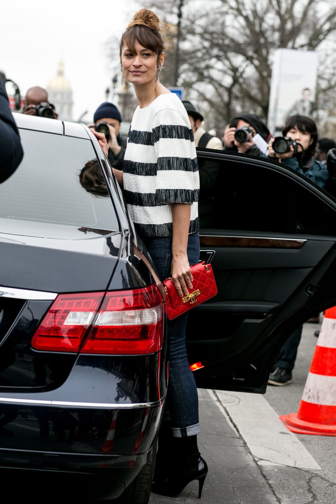 The definition of Parisian chic in stripes and a pop of red.