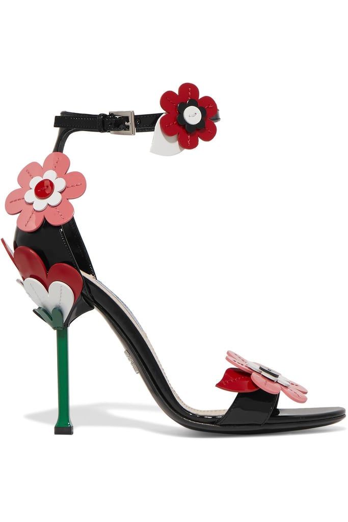 Prada's Floral Appliquéd Patent Leather Sandals ($1,125) are a quick trip to the garden.