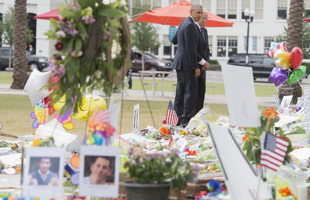 President Obama and Vice President Biden pause before leaving the memorial.