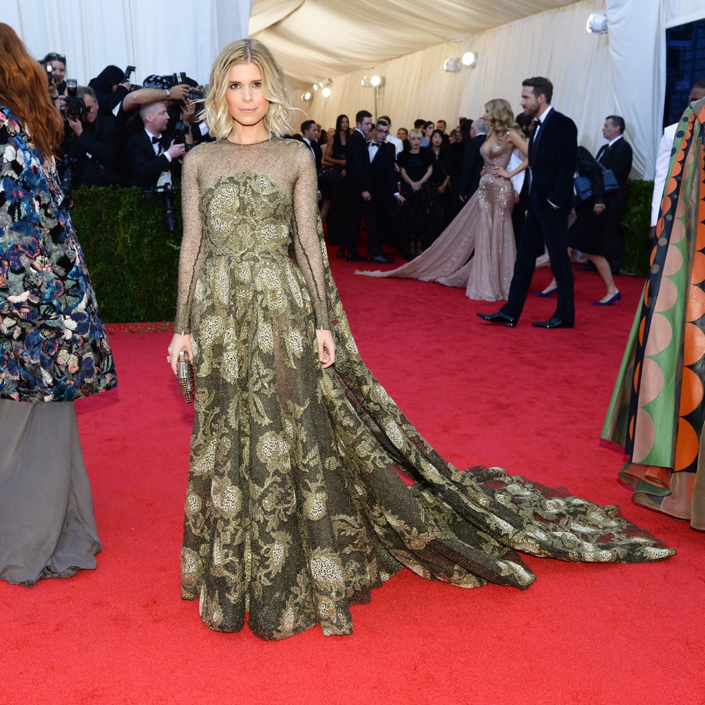 Blake Lively and Ryan Reynolds popped up behind Kate Mara.