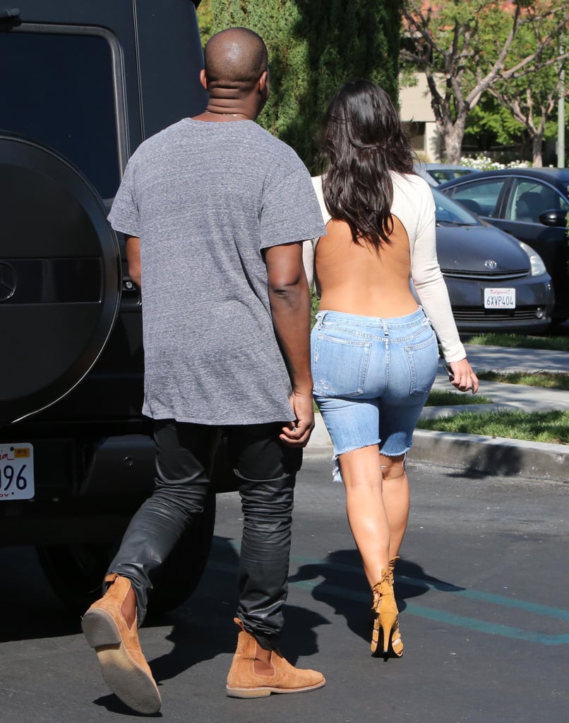 Kim Kardashian in a Backless White Shirt | Photos