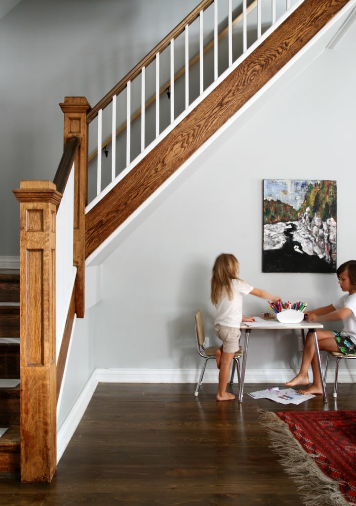 An art table under the stairs