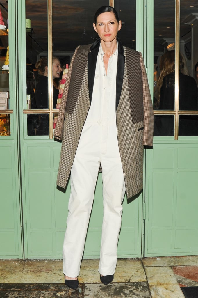 A simple white jumpsuit might be the painter's go-to uniform, but it's automatically ready for a downtown sophisticate thanks to the addition of a tailored overcoat.