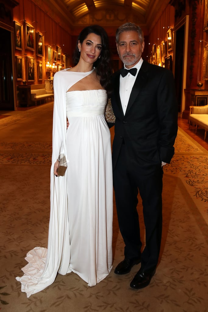 Amal looking like a Grecian goddess in this beautiful white William Vintage caped gown.