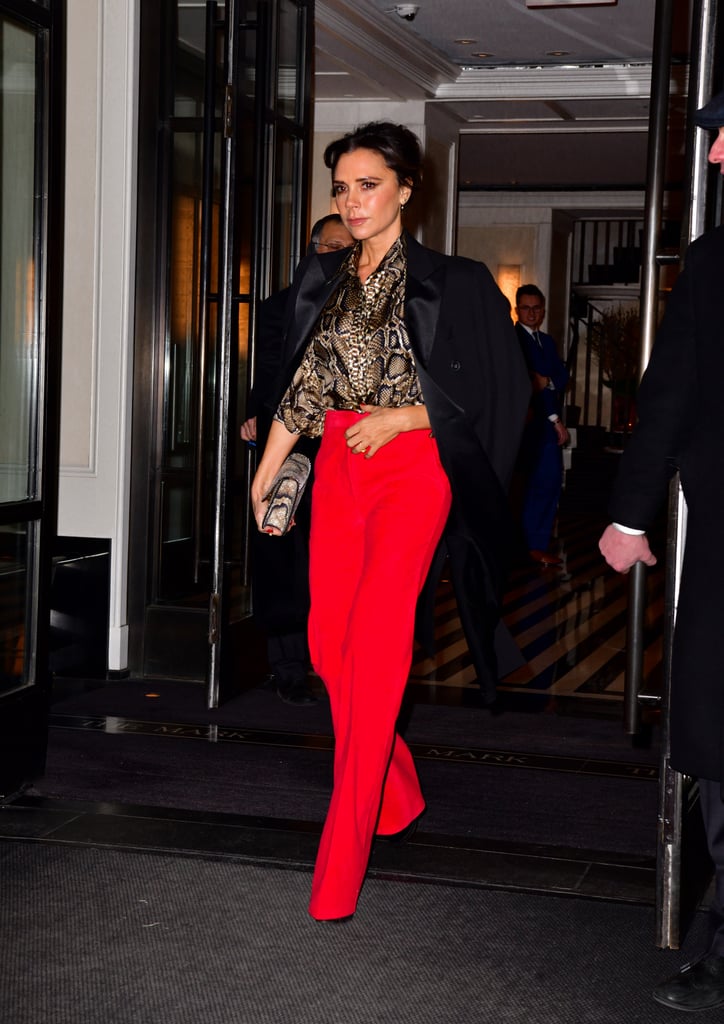 Victoria Beckham Red Pants and Snakeskin Blouse January 2019