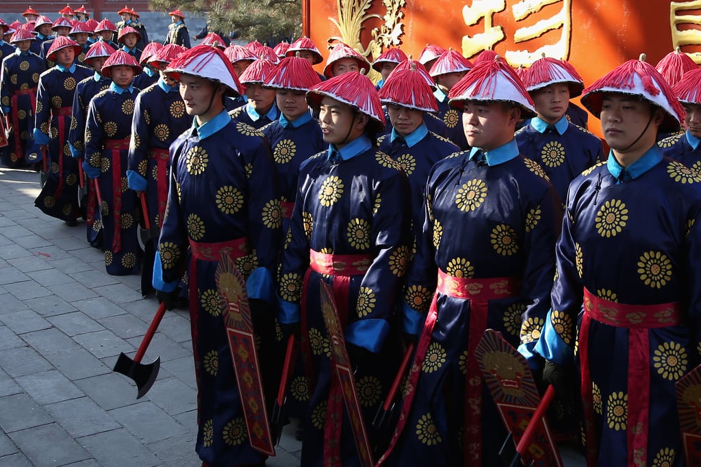 In Beijing, Chinese paramilitary police officers reenacted an ancient ceremony.