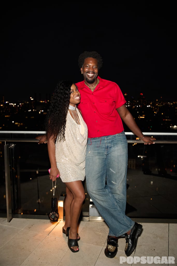 Jessica Andrews and Alexander Julian Gibson pose outside.