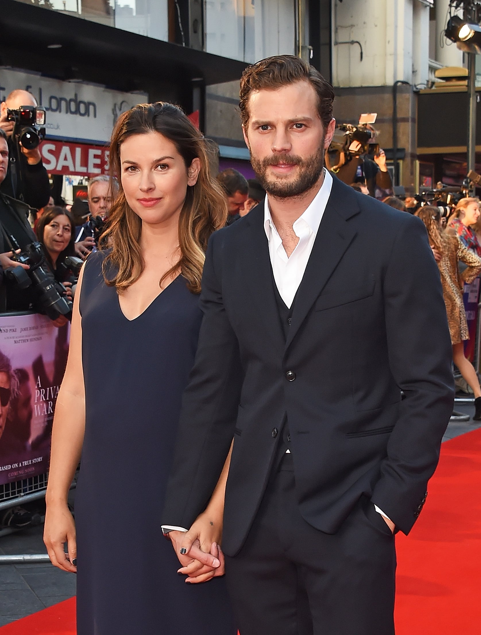 LONDON, ENGLAND - OCTOBER 20:  Amelia Warner and Jamie Dornan attend the European Premiere and Mayor of London Gala screening of 