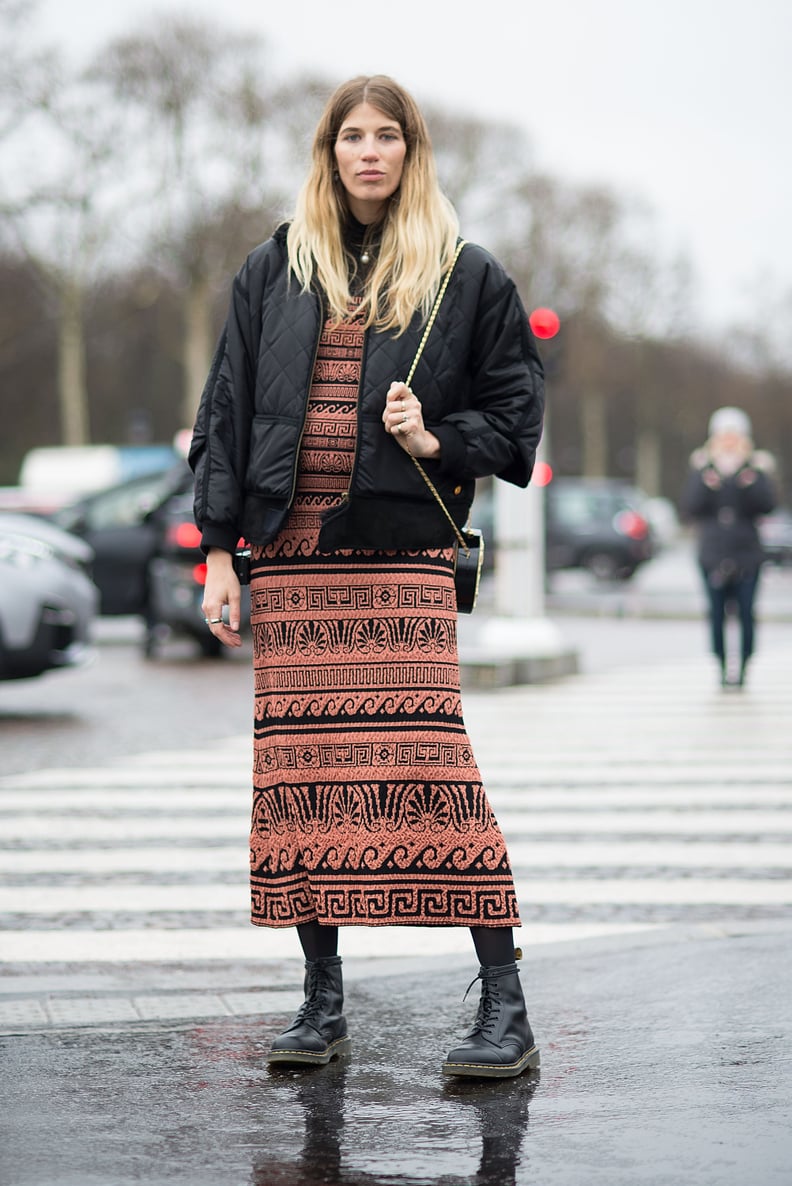 Show Off a Classic Black Pair of Boots in a Printed Dress