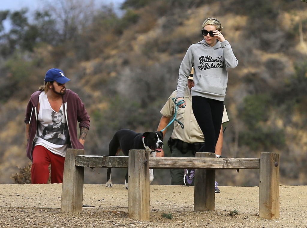 Miley Cyrus went hiking with her dog and dad Billy Ray Cyrus in LA on Tuesday.