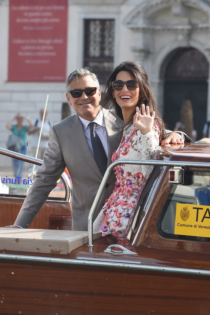 George and Amal smiled and waved for their first photos as newlyweds in Venice during their September 2014 wedding weekend. George and Amal smiled and waved for their first photos as newlyweds in Venice during their September 2014 wedding weekend.