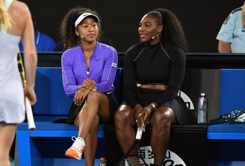 Naomi Osaka of Japan (L) and Serena Williams of the US (R) share a lighter moment as they and other top players play in the Rally for Relief charity tennis match in support of the victims of the Australian bushfires, in Melbourne of January 15, 2020, ahea