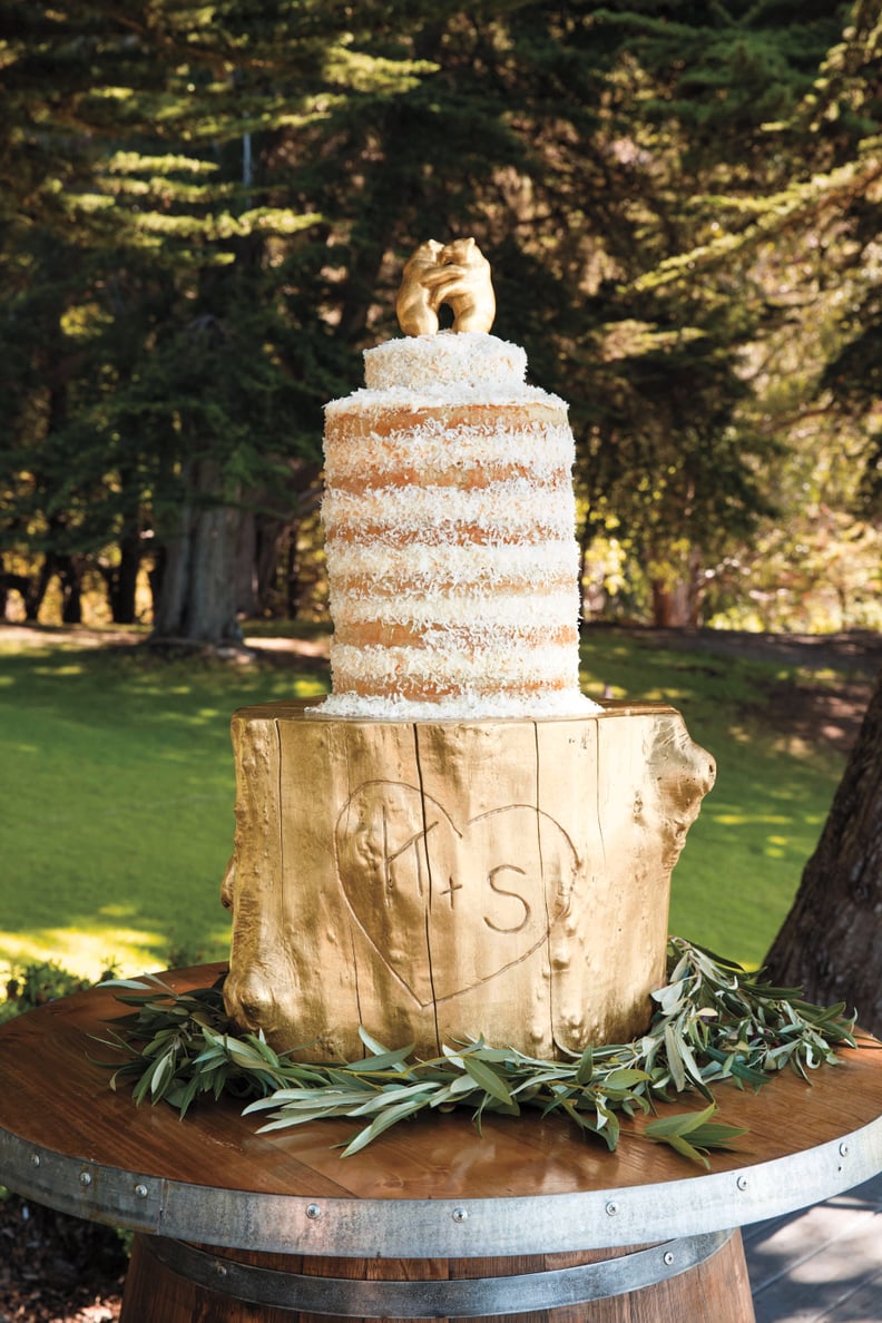 Gilded bear cake topper and stump cake stand