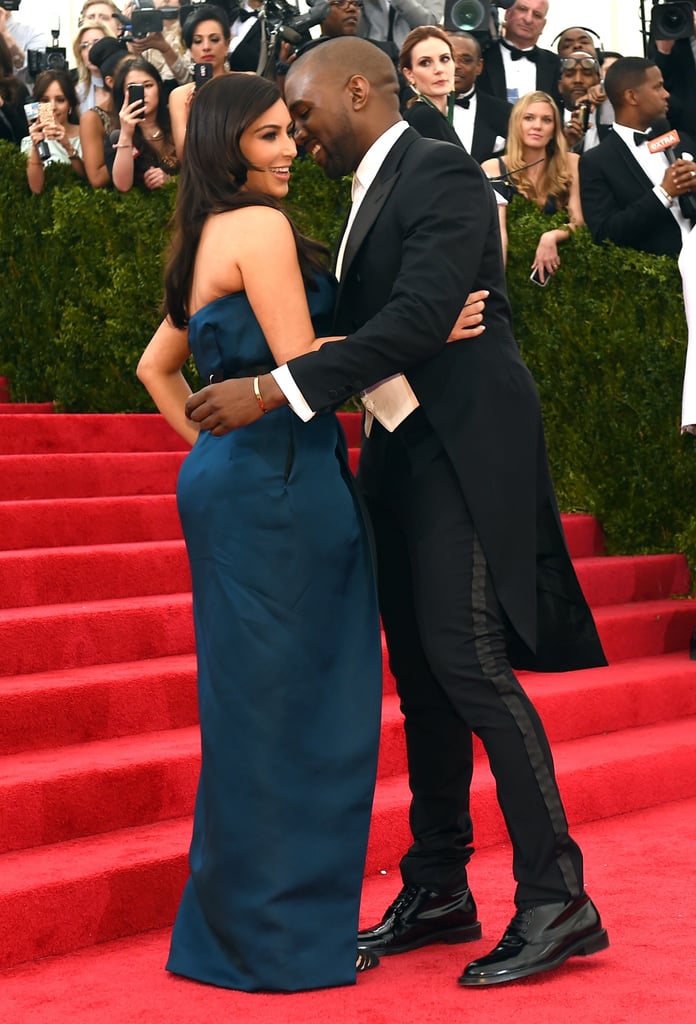 Kim Kardashian and Kanye West shared a moment on the stairs.