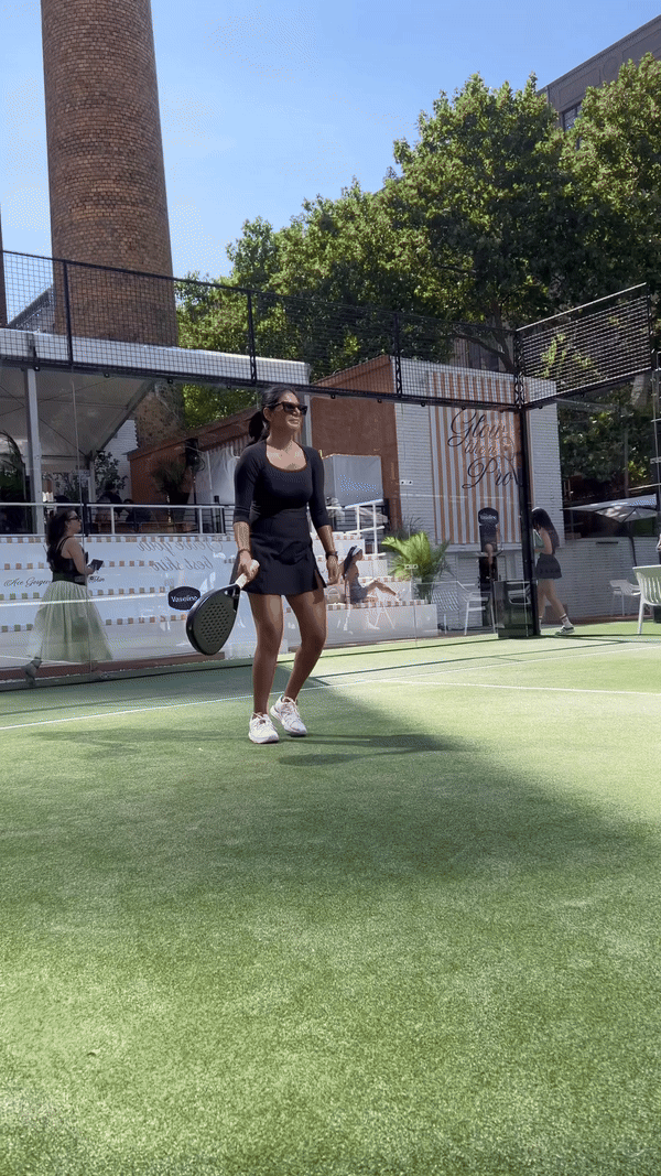 Woman playing padel wearing the On Roger Clubhouse Pro Shoes.