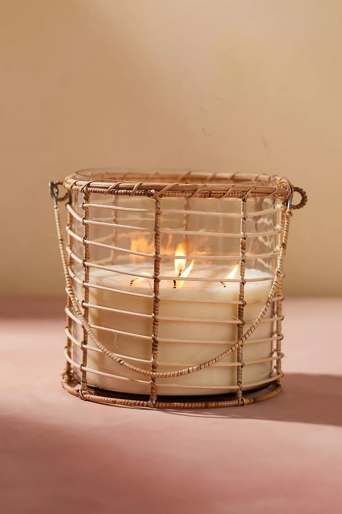 A Citronella Candle: Rattan Wrapped Hanging Candle