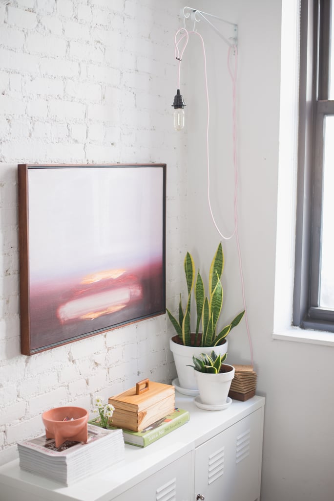 A further pop of color comes from a light's dangling cord.