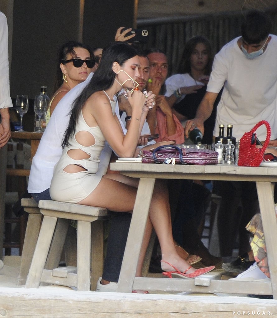 Dua Lipa Wearing a Beige Cutout Dress on Holiday in Ibiza