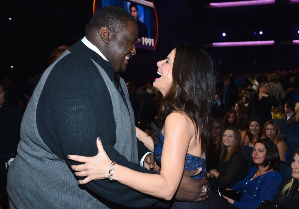 Sandra Bullock greeted her Blind Side co-star Quinton Aaron at the People's Choice Awards.
Sandra Bullock greeted her Blind Side co-star Quinton Aaron at the People's Choice Awards.