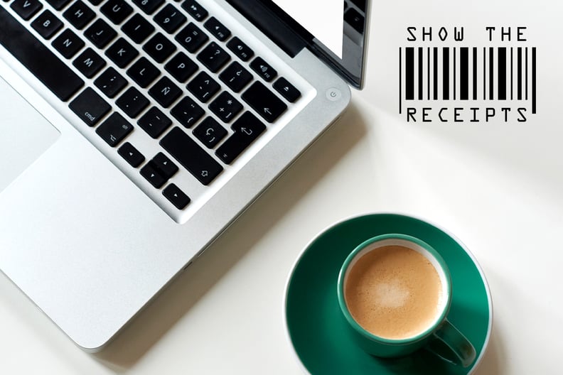 a laptop computer and cup of coffee