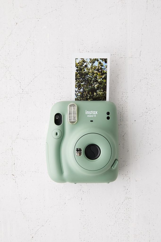 An Instant Camera: Fujifilm UO Exclusive Instax Mini 11 Instant Camera