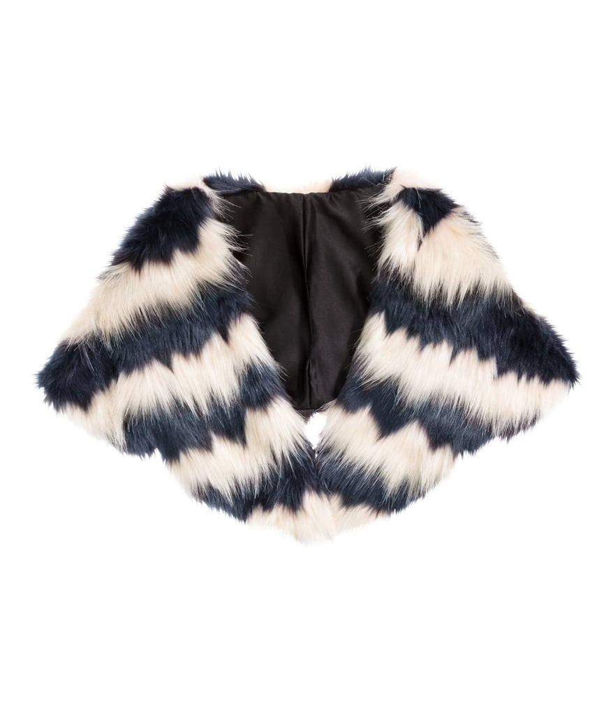 This season I'm going to accessorize with luxe, furry scarves — they’ll make me feel better about combating those harsh Winter winds in style. I'm starting with this H&M Faux Fur Collar ($35).
— SW