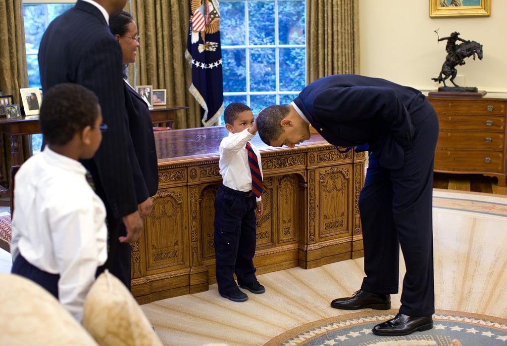 Obliging when the son of a staffer wants to see if the president's hair feels like his.