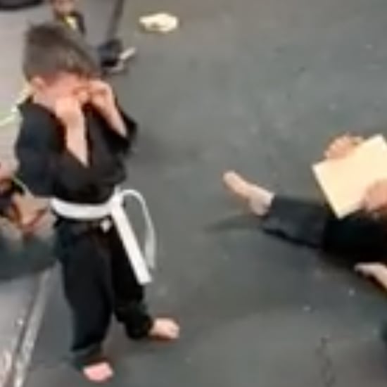 Boy Not Giving Up Trying to Break a Board With His Foot